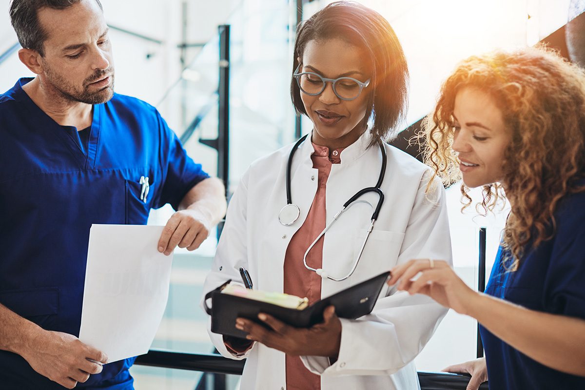 Healthcare team reviewing notes together
